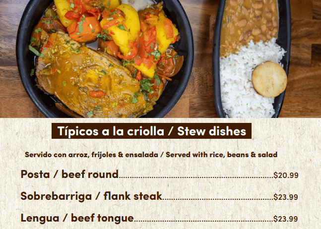 Menú de comida criolla con platos contundentes de la gastronomía local, servidos con guarniciones clásicas.
